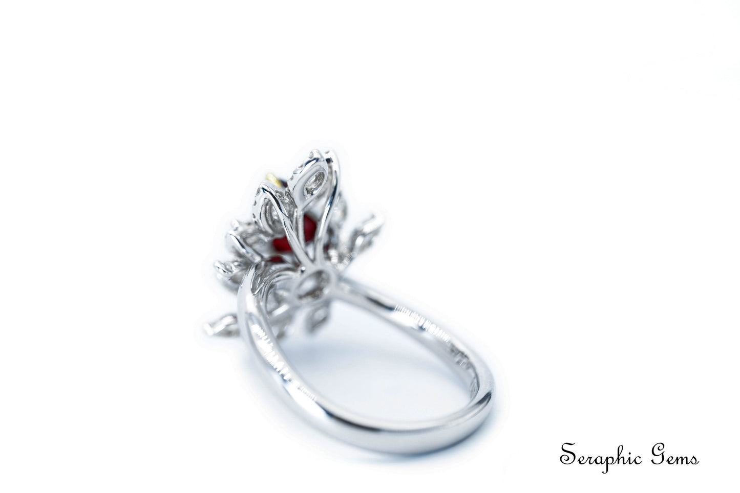 "Radiate Timeless Elegance: The Exquisite Pear-Shaped Pigeon Blood Ruby Ring with Leaf-Inspired Diamond Setting"