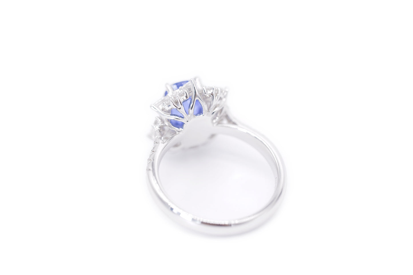 "Radiant Majesty: 3.01ct Sapphire and Diamond Halo Ring"