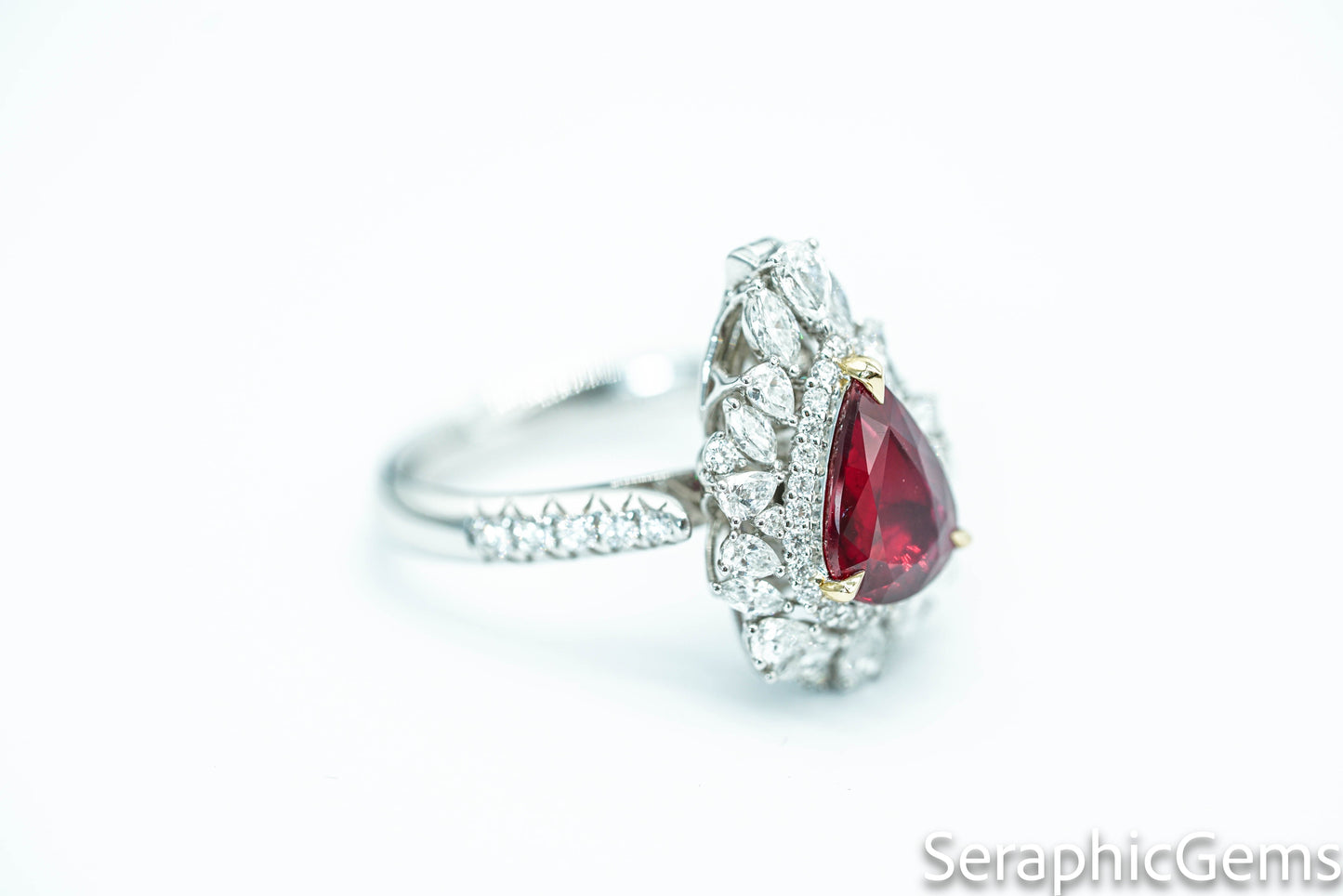 "Timeless Elegance: Pear-Shaped Pigeon Blood Ruby Ring in 18K Gold"