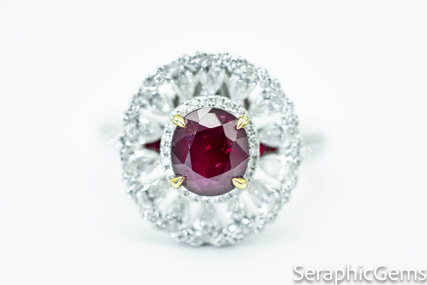 "Regal Radiance: Oval-Cut Ruby and Diamond Halo Ring"