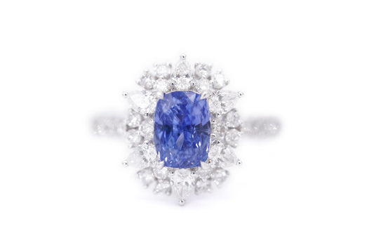 "Radiant Majesty: 3.01ct Sapphire and Diamond Halo Ring"