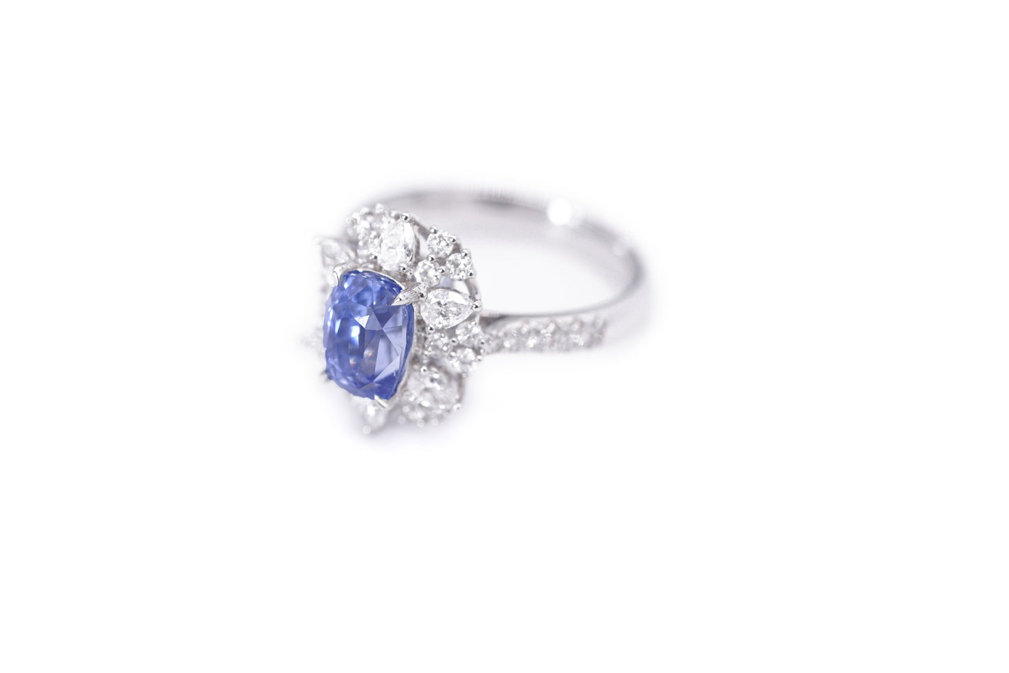 "Radiant Majesty: 3.01ct Sapphire and Diamond Halo Ring"
