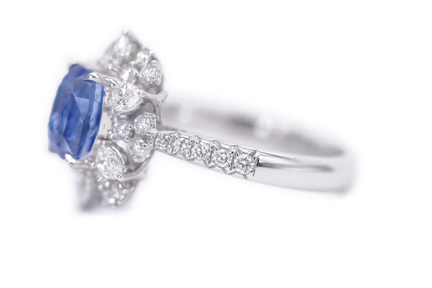 "Radiant Majesty: 3.01ct Sapphire and Diamond Halo Ring"