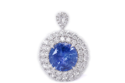 "Enchanted Elegance: Round-Cut Sapphire and Diamond Halo Ring"