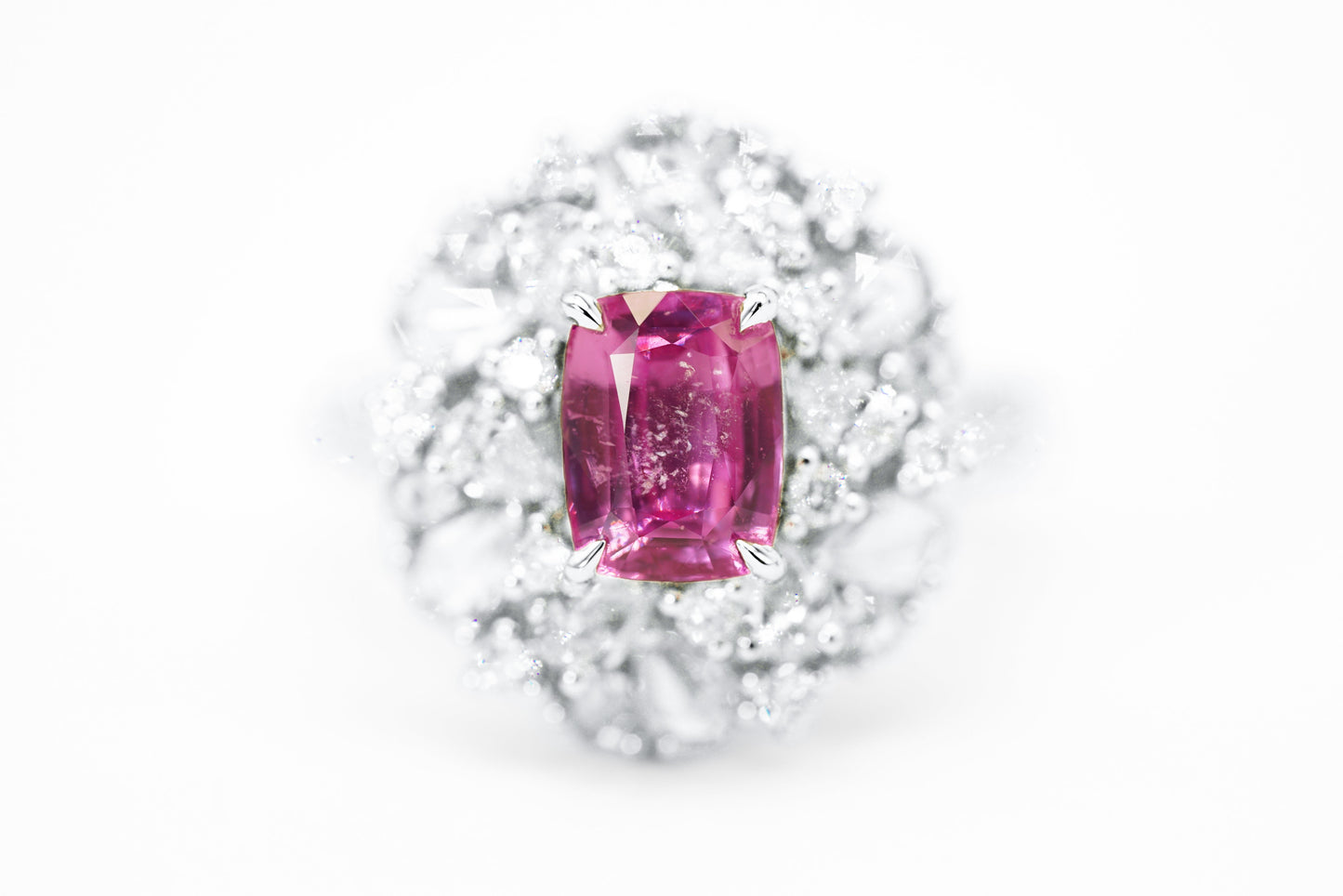 "Dreamy Elegance: Pinkish-Purple Sapphire and Diamond Halo Ring"